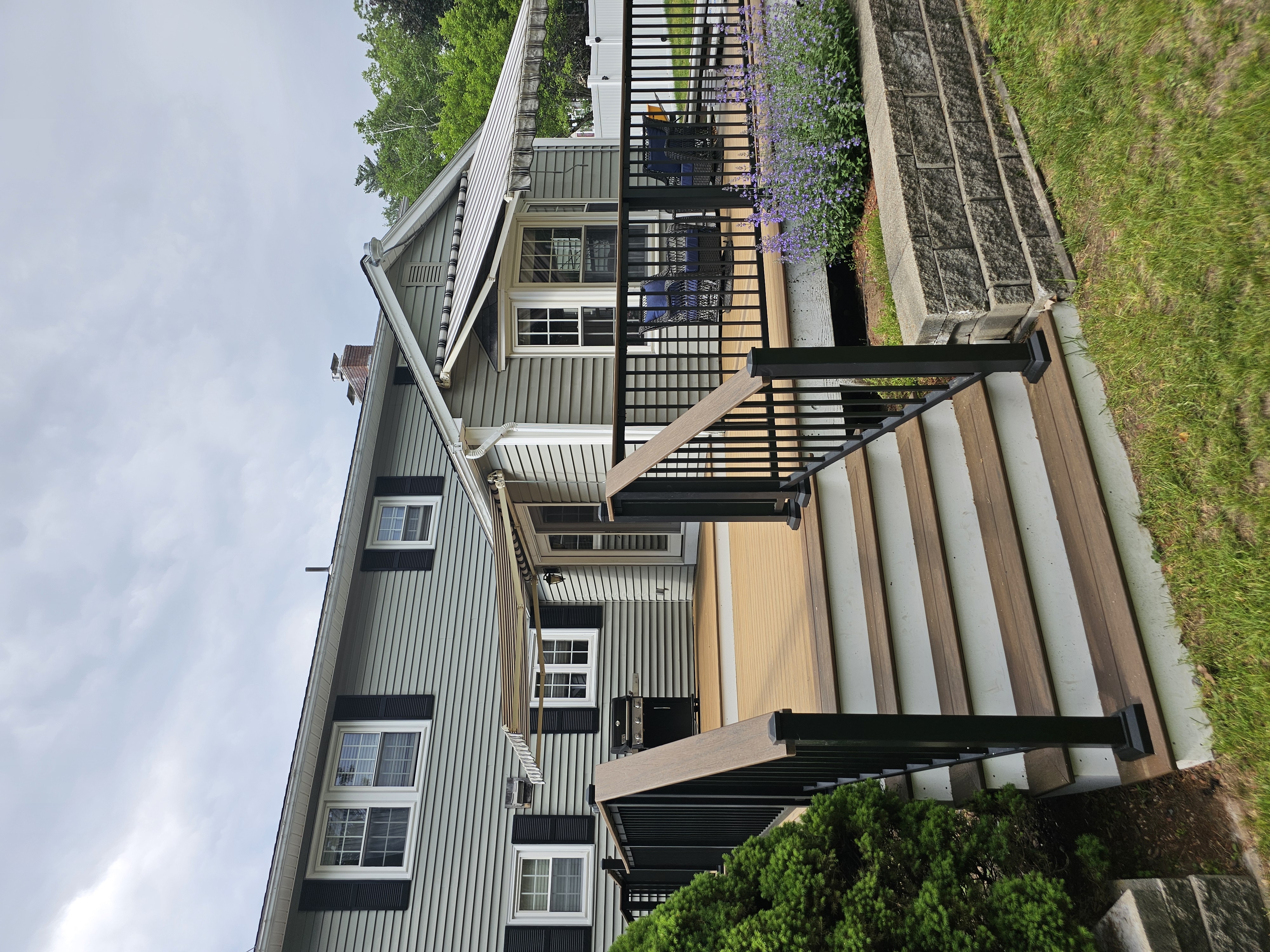 Outdoor deck renovation enhancing backyard living space