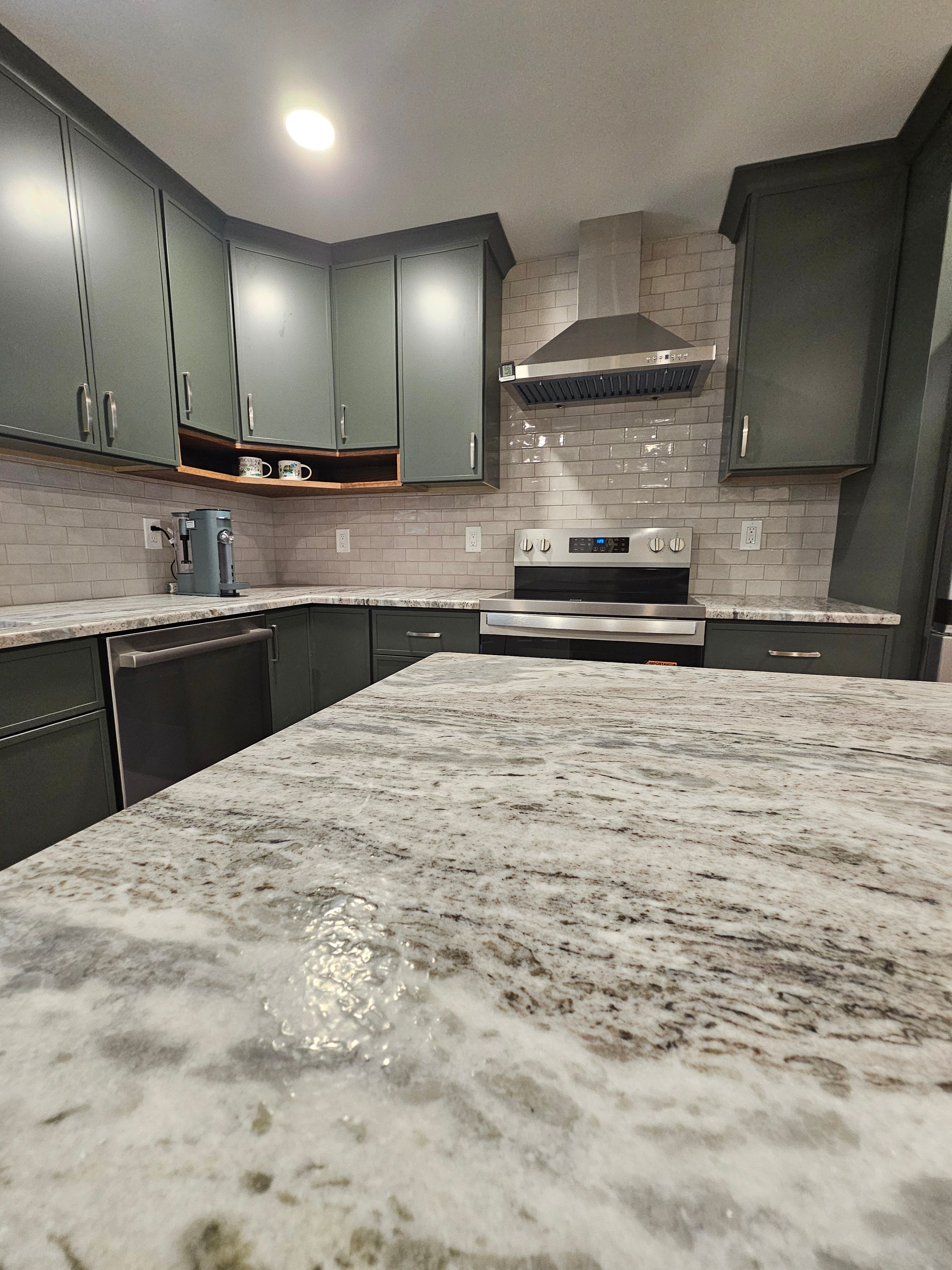 Beautiful kitchen remodel with custom cabinets and modern countertops in Hudson NH