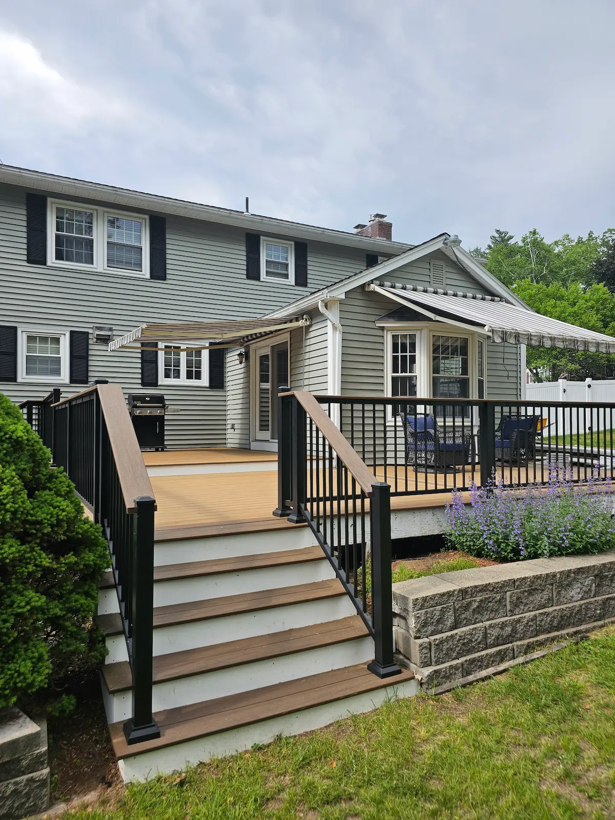 Outdoor deck renovation enhancing backyard living space