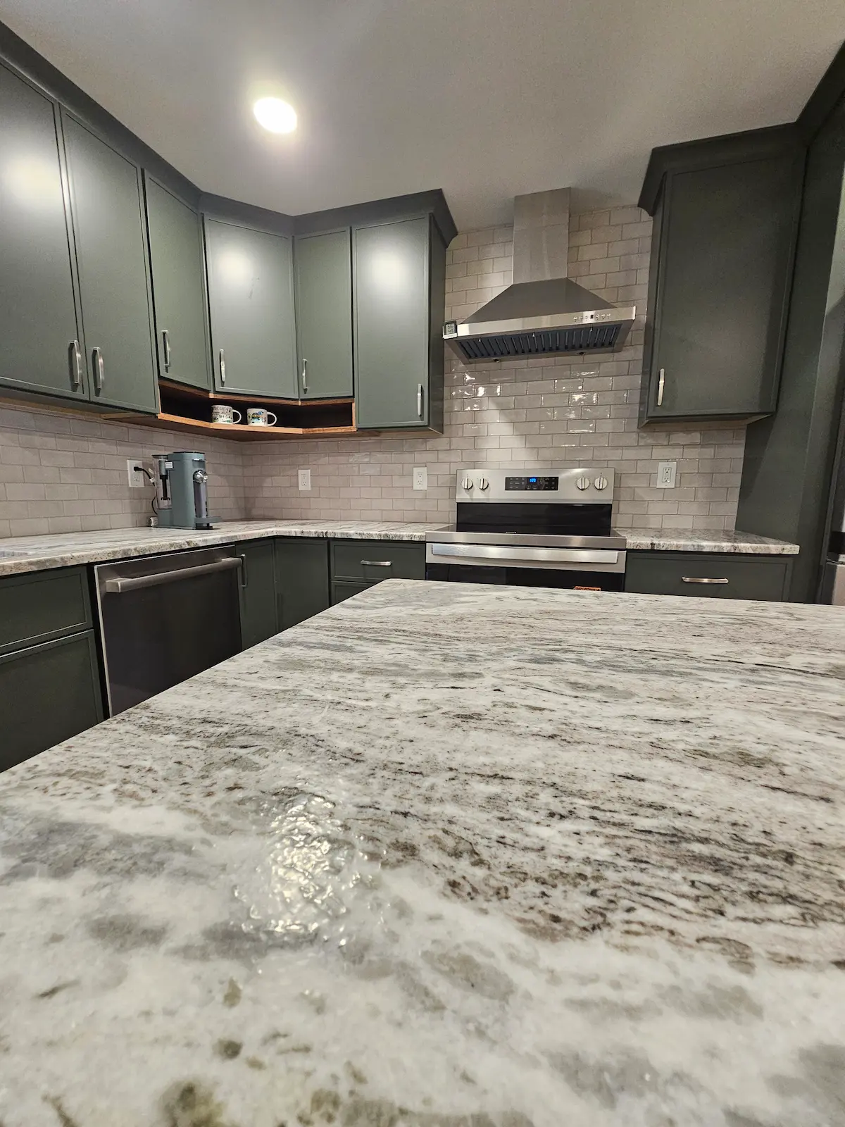 Beautiful kitchen remodel with custom cabinets and modern countertops in Hudson NH